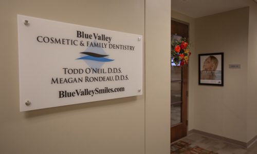 blue valley smiles sign