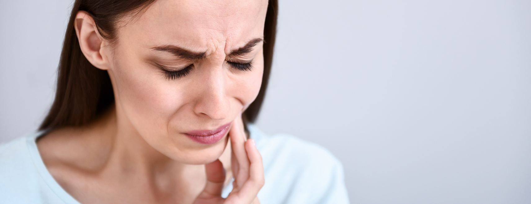 woman with mouth pain