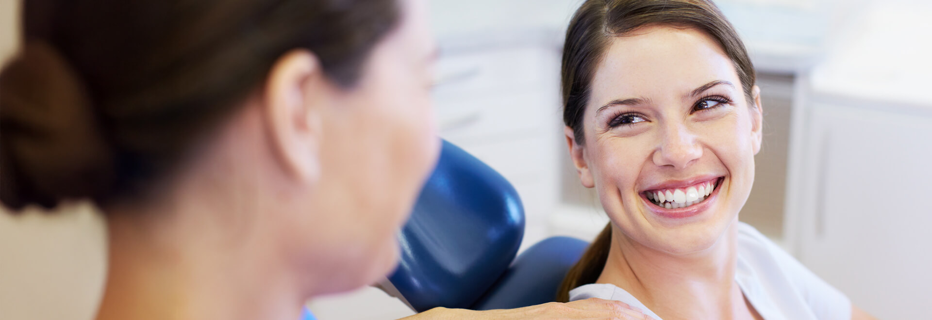 woman smiling at the dentist