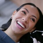 woman at family dentist in overland park, KS Blue Valley Smiles